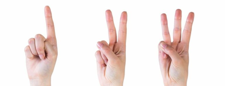 three hands holding one, two and three fingers
