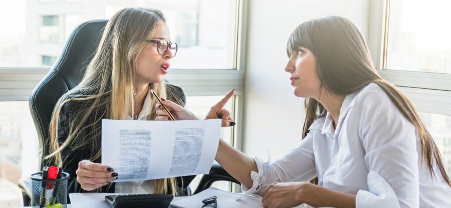 Two young woman in a meeting