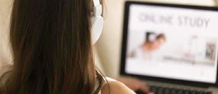 Female student choosing course for distance learn