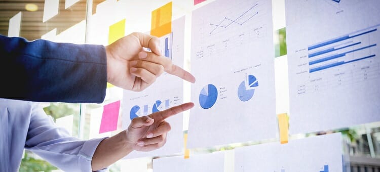 Businessman making presentation with his colleagues and business
