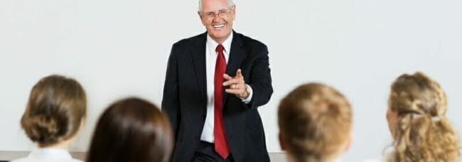 Senior Speaker Communicating with Audience