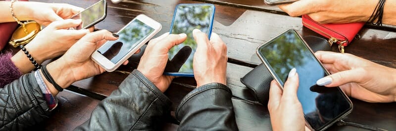 Teenager people having fun using smartphones