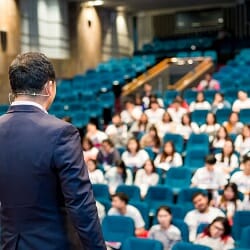 The Speaker Talking About Business Conference