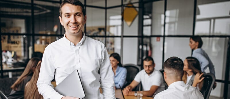 Group of people working out business plan in an office